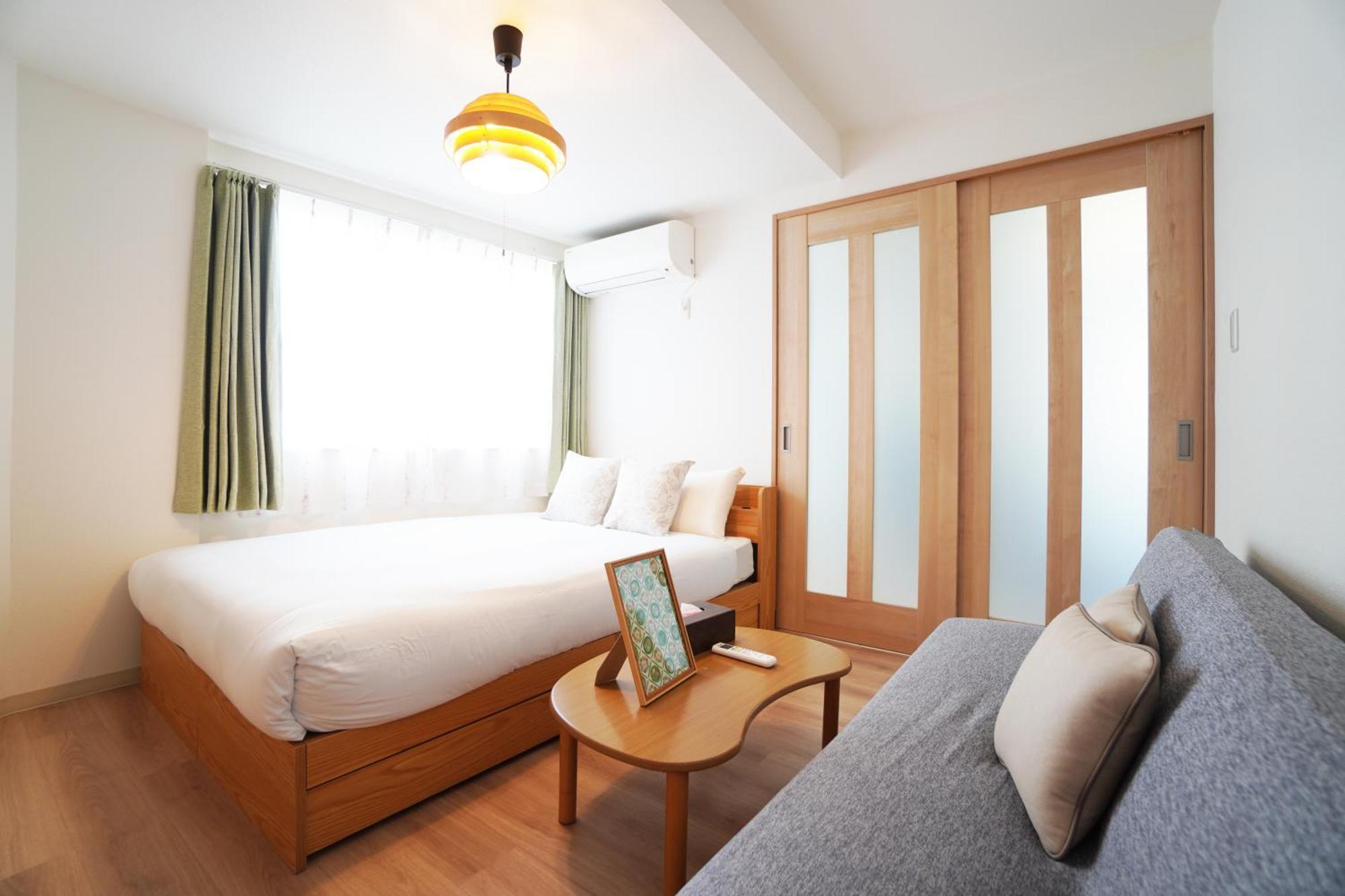 Ferienwohnung Akimi Building Ōsaka Exterior foto