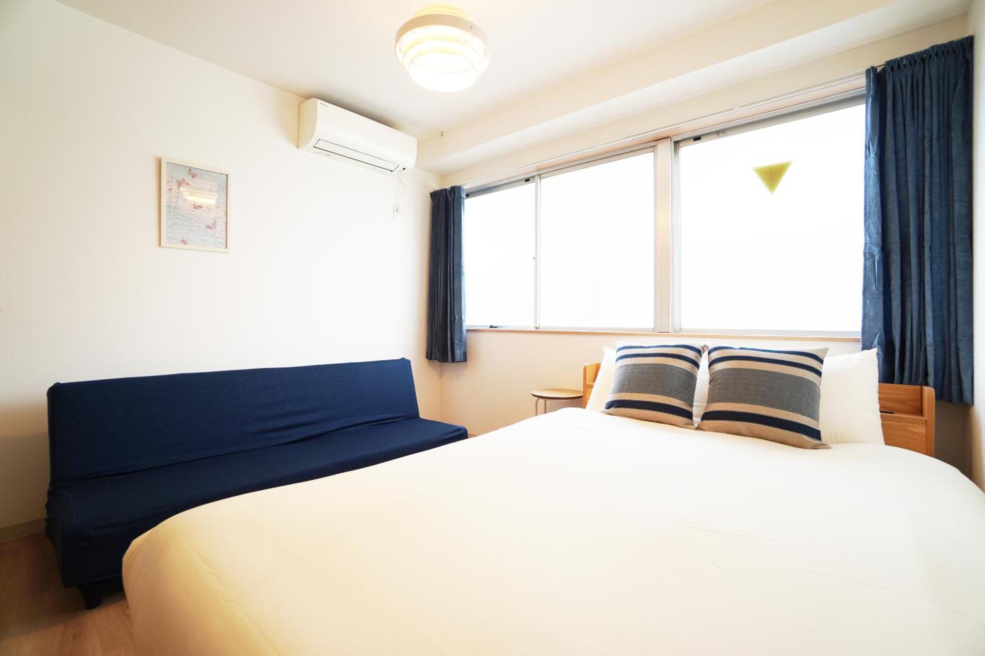 Ferienwohnung Akimi Building Ōsaka Exterior foto