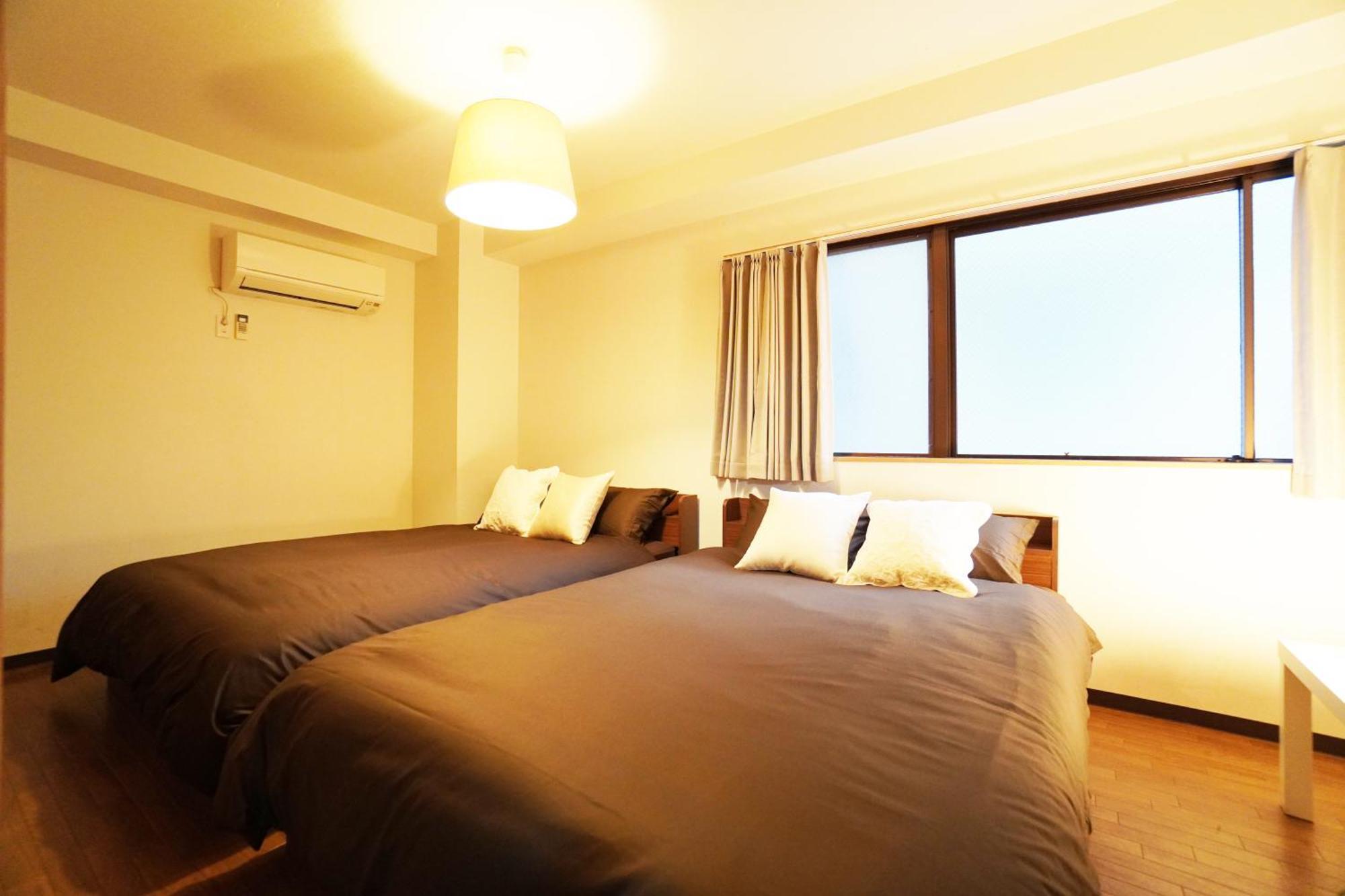 Ferienwohnung Akimi Building Ōsaka Exterior foto
