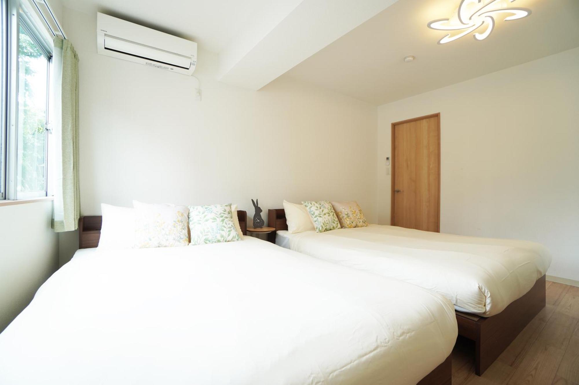 Ferienwohnung Akimi Building Ōsaka Exterior foto