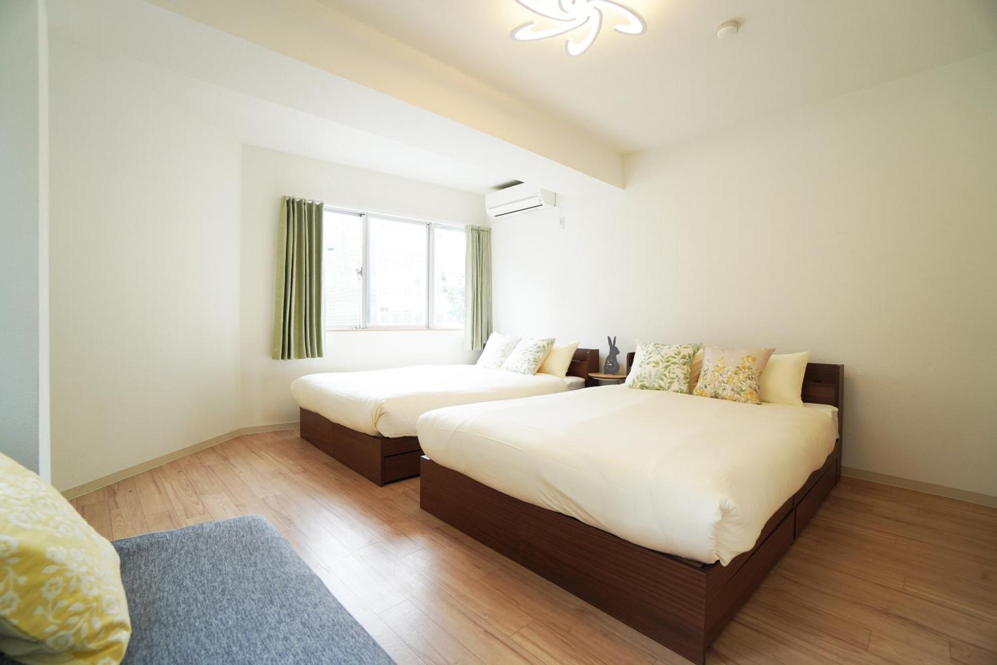 Ferienwohnung Akimi Building Ōsaka Exterior foto